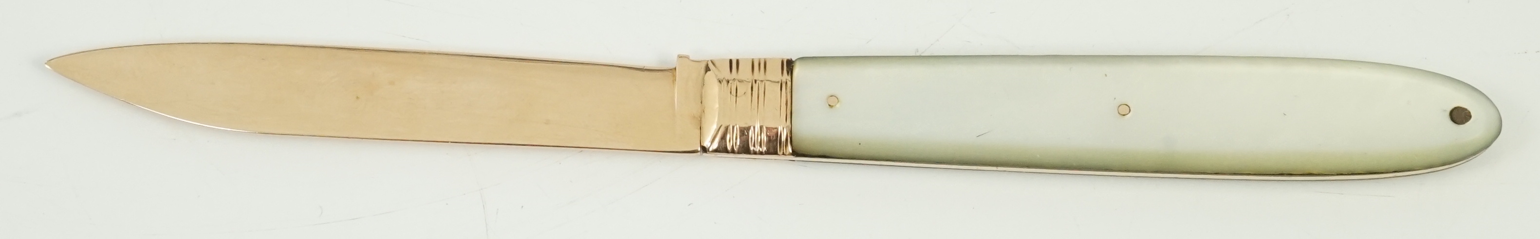 A George III mother of pearl mounted gold fruit knife